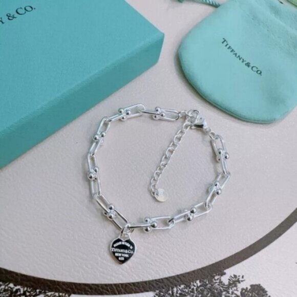 Tiffany & Co. Heirloom Silver Heart Tag Bracelet - Picture 1 of 5